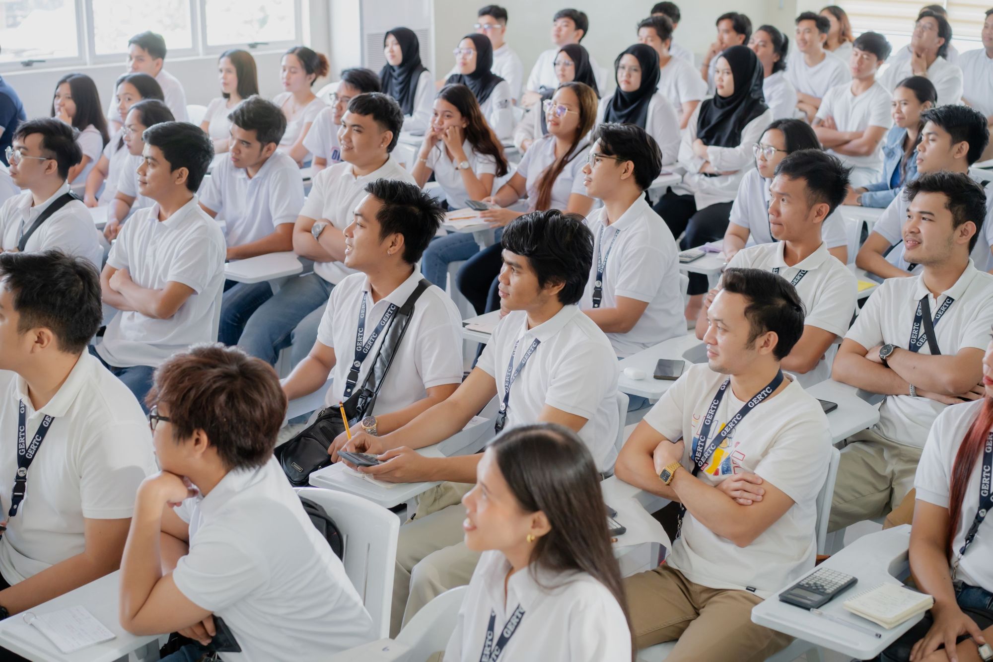 A full GERTC class listening to a lecture